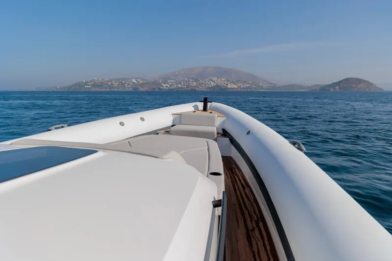 Rock Marine Rm 40 Yacht Photos Pics 2026 Rock Marine RM 40 boat cruising on open sea with scenic coastal view.