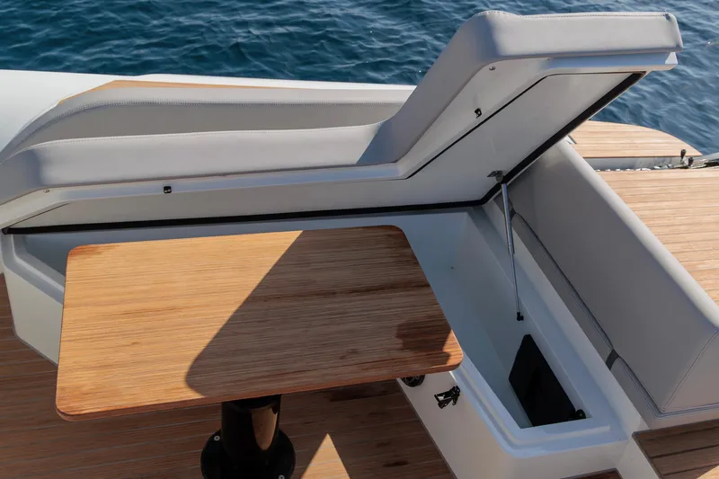 Rock Marine Rm 40 Yacht Photos Pics Luxury seating and table on 2026 Rock Marine RM 40 yacht, overlooking the ocean.