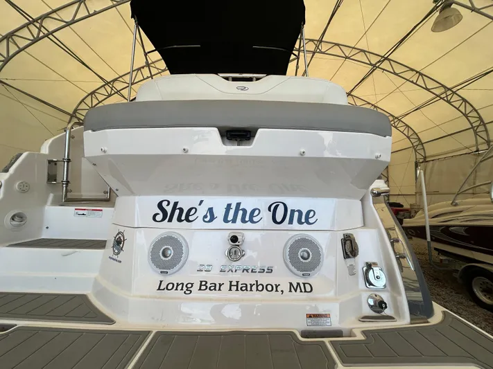  Yacht Photos Pics 2021 Regal 2800 Express boat with "She's the One" text, docked at Long Bar Harbor, MD.