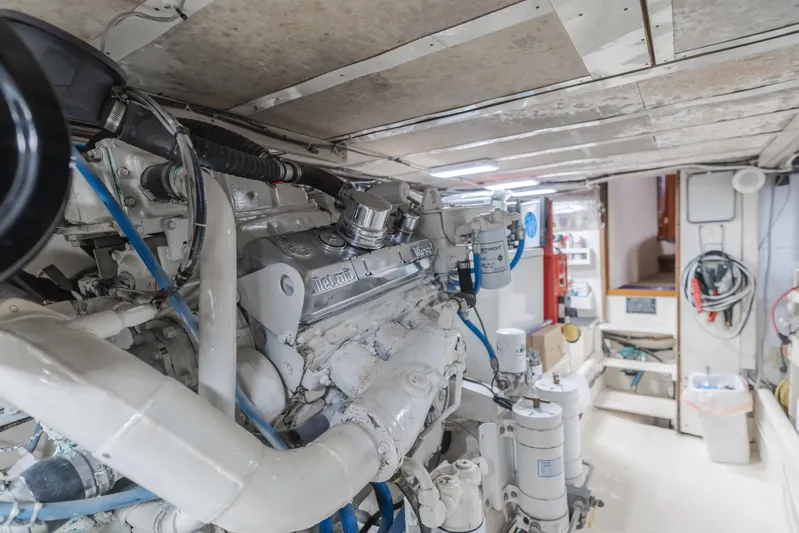 Vin Santo Yacht Photos Pics Engine room of a 1984 Vic Franck pilothouse yacht, showcasing mechanical components and equipment.