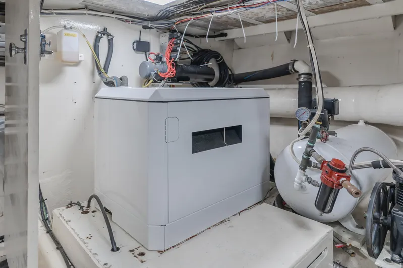 Vin Santo Yacht Photos Pics Engine room of 1984 Vic Franck pilothouse with machinery and wiring.