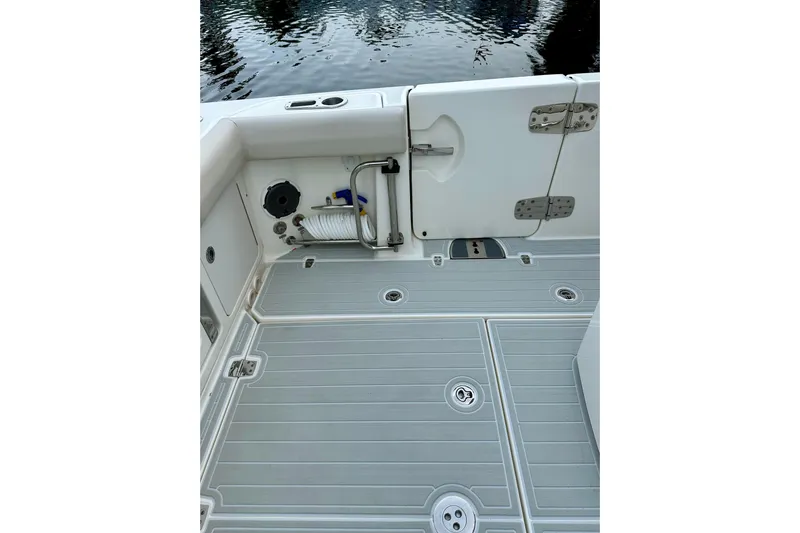  Yacht Photos Pics 2020 Boston Whaler 330 Outrage deck with storage and water access.