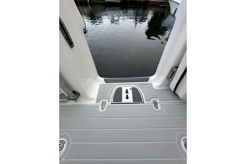  Yacht Photos Pics 2020 Boston Whaler 330 Outrage boat deck with water view.