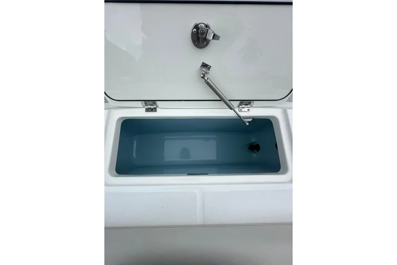  Yacht Photos Pics Open storage compartment on 2020 Boston Whaler 330 Outrage boat.