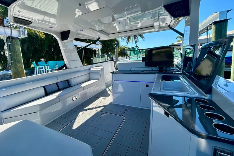 Happy Our II Yacht Photos Pics Luxurious interior of 2022 Aviara AV40 OB boat with sleek seating and modern amenities.