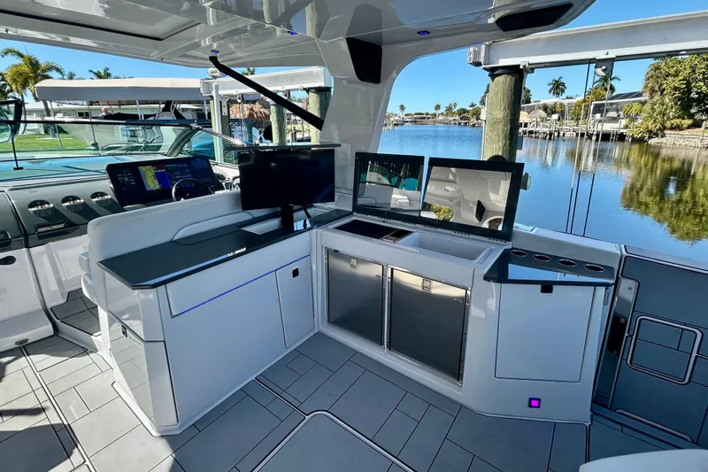 Happy Our II Yacht Photos Pics Luxurious 2022 Aviara AV40 OB boat interior with modern amenities and scenic waterfront view.