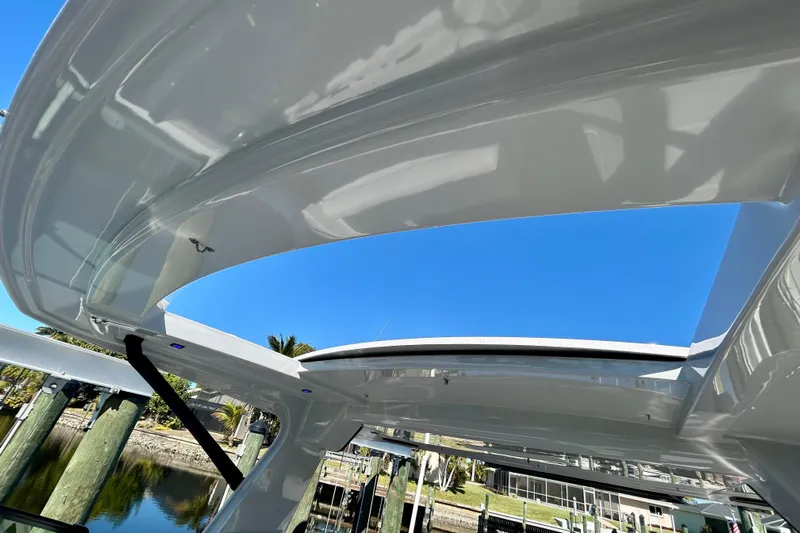 Happy Our II Yacht Photos Pics 2022 Aviara AV40 OB boat roof detail with clear blue sky background.