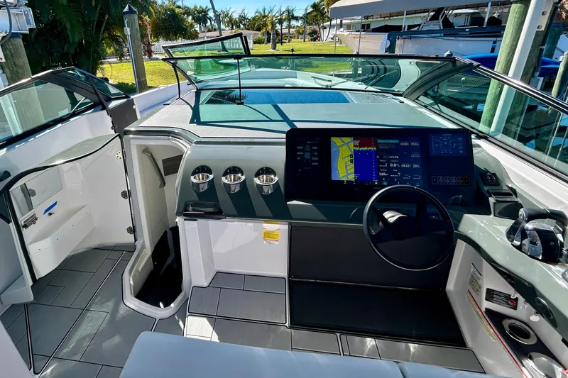 Happy Our II Yacht Photos Pics 2022 Aviara AV40 OB boat cockpit with modern navigation system and sleek design.