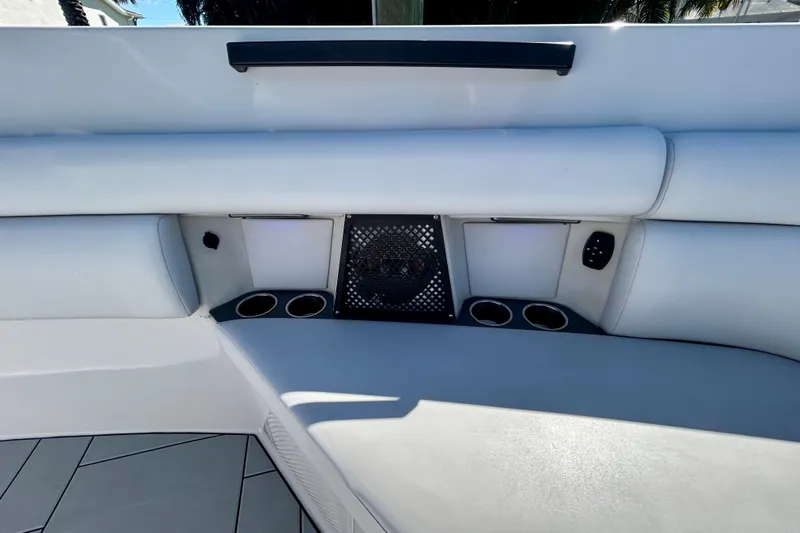 Happy Our II Yacht Photos Pics Luxurious seating area on 2022 Aviara AV40 OB boat with cup holders and speaker.