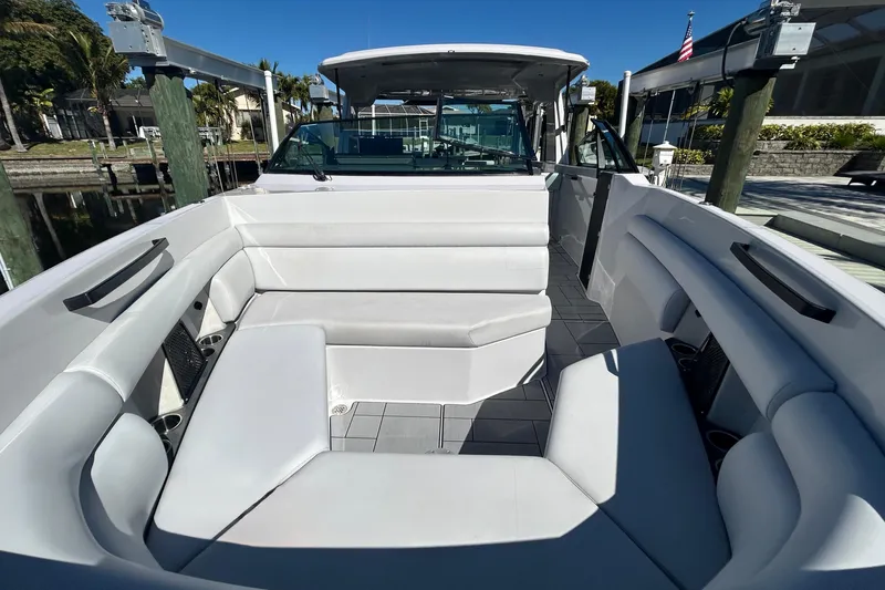 Happy Our II Yacht Photos Pics 2022 Aviara AV40 OB boat with spacious white seating and sleek design.