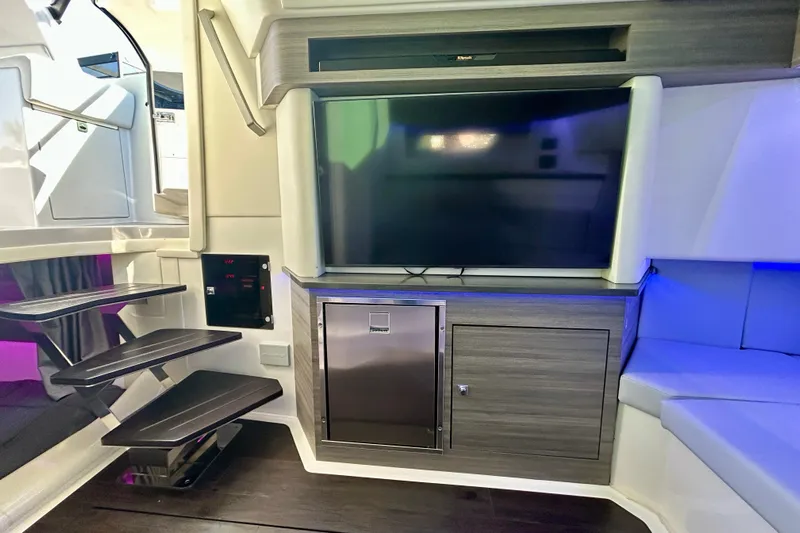 Happy Our II Yacht Photos Pics Interior of 2022 Aviara AV40 OB boat with modern entertainment system and sleek design.