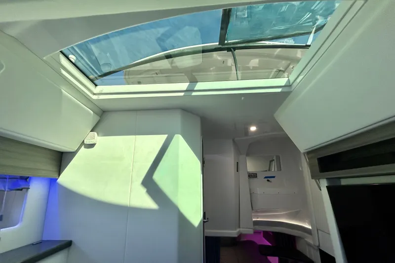 Happy Our II Yacht Photos Pics Interior view of 2022 Aviara AV40 OB boat with skylight and modern design.