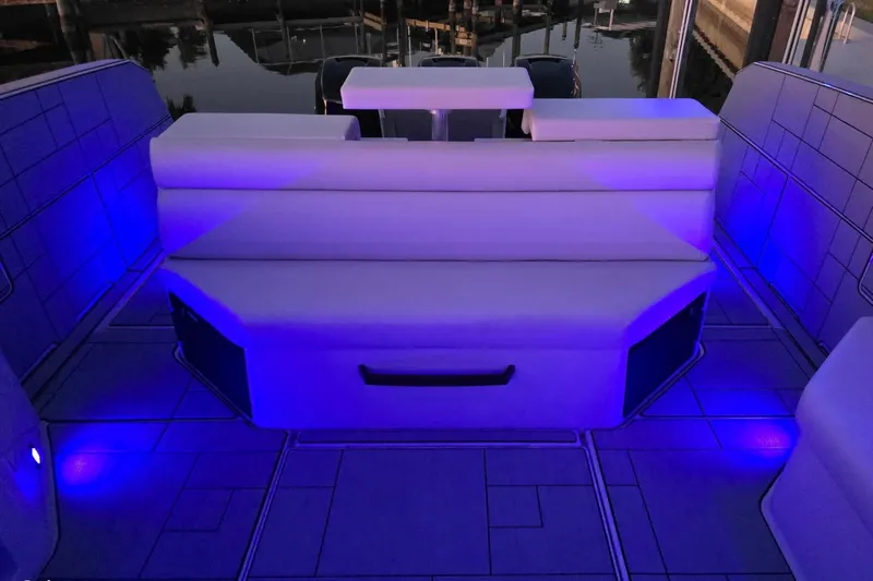 Happy Our II Yacht Photos Pics 2022 Aviara AV40 OB boat interior with blue LED lighting and white seating.