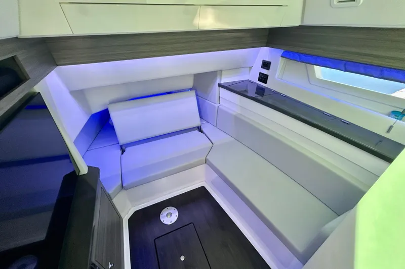 Happy Our II Yacht Photos Pics 2022 Aviara AV40 OB interior with modern seating and ambient lighting.