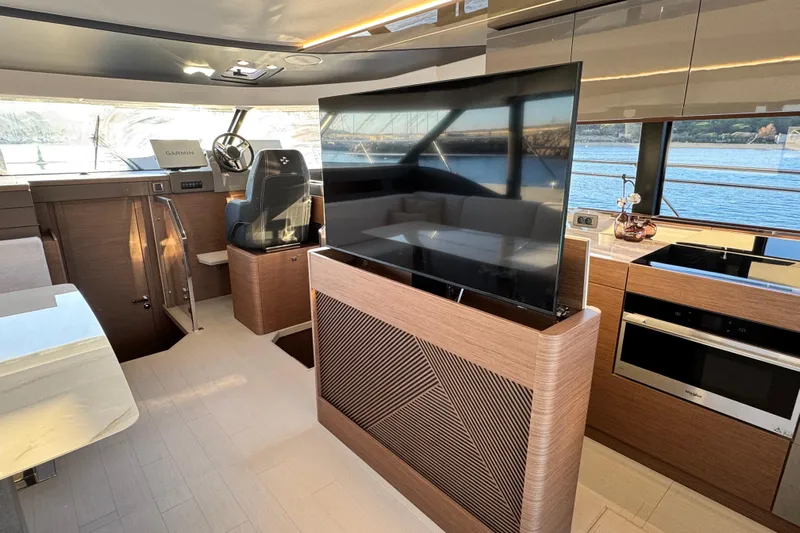  Yacht Photos Pics Luxurious interior of 2024 Prestige M48 yacht with modern amenities and panoramic views.