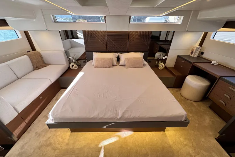  Yacht Photos Pics Luxurious 2024 Prestige M48 yacht bedroom with modern design and elegant furnishings.