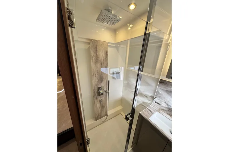  Yacht Photos Pics Luxurious shower in 2024 Prestige M48 yacht, featuring modern fixtures and elegant design.