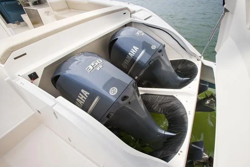 Worth Pursuit Yacht Photos Pics Manufacturer Provided Image: Twin Yamaha 350 engines on a 2013 Pursuit SC 365i Sport Coupe boat.