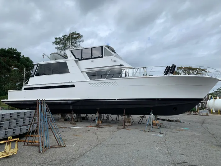 Limitless Yacht Photos Pics 1998 Viking 60 CMY yacht on dry dock for maintenance.
