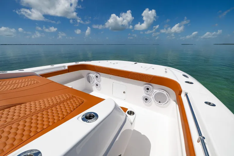  Yacht Photos Pics Invincible 46 Pilothouse 2023 boat interior with luxurious seating and ocean view.