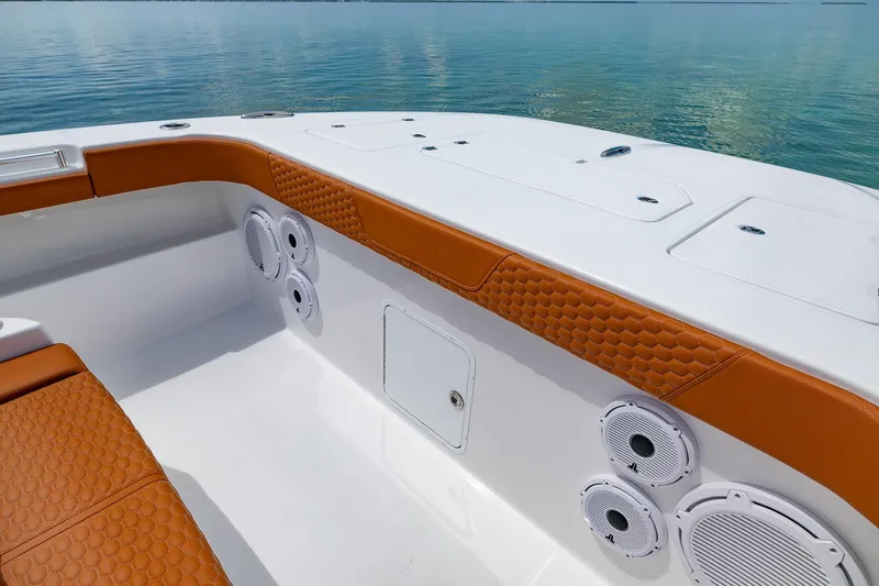  Yacht Photos Pics Luxurious seating on 2023 Invincible 46 Pilothouse boat with ocean view.