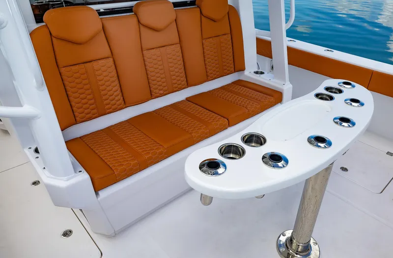  Yacht Photos Pics Luxurious seating and rod holders on 2023 Invincible 46 Pilothouse boat.