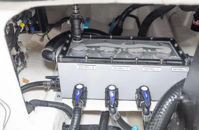  Yacht Photos Pics 2023 Invincible 46 Pilothouse baitwell system with labeled valves and hoses.