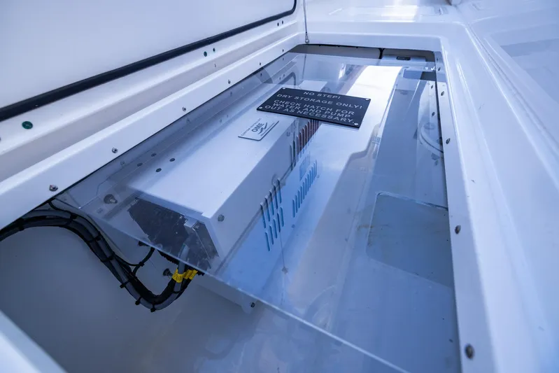  Yacht Photos Pics 2024 Invincible 46 Pilothouse electrical compartment with protective cover and wiring.