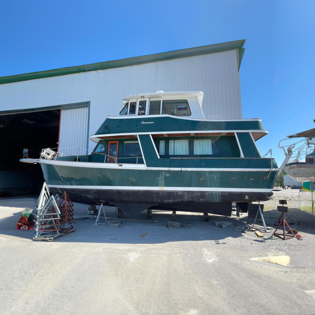 1966 Vinette 430 Trawler in dry dock, green hull