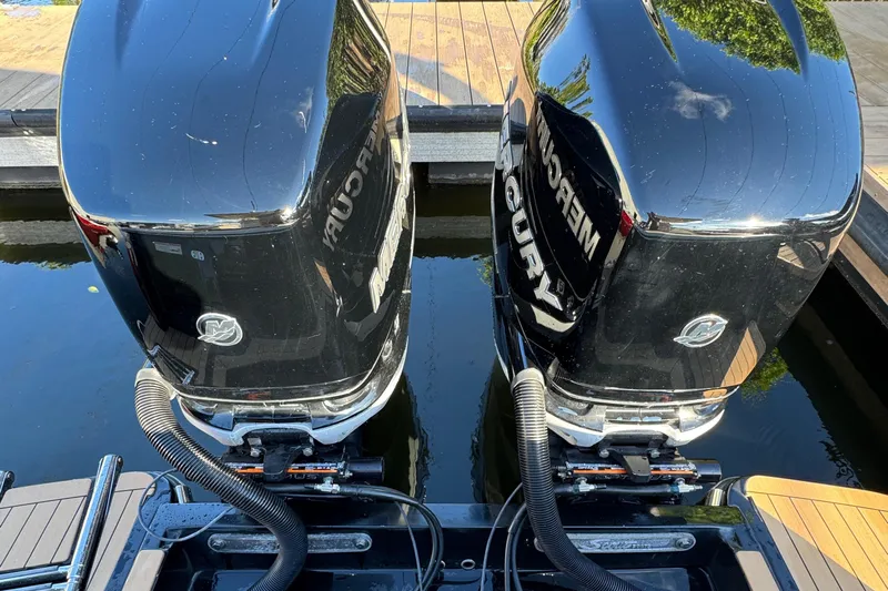  Yacht Photos Pics 2018 Scout 300 LXF with twin Mercury outboard engines docked.