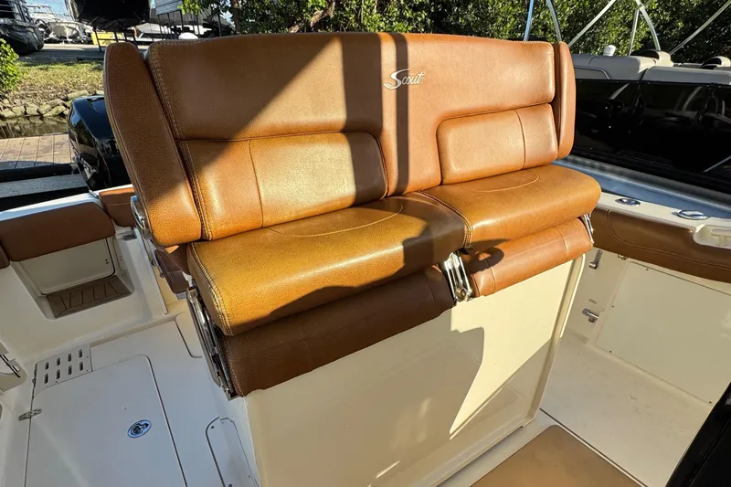  Yacht Photos Pics 2018 Scout 300 LXF boat with tan leather seating in sunlight.