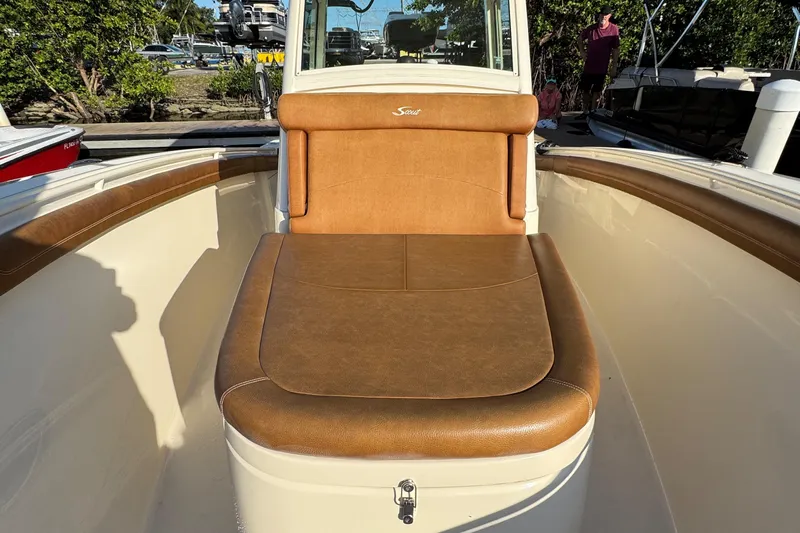  Yacht Photos Pics 2018 Scout 300 LXF boat interior with brown leather seating.