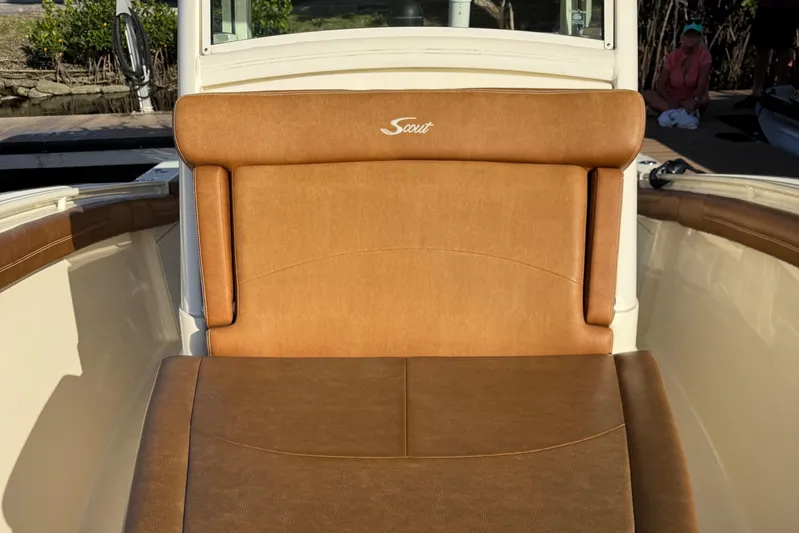  Yacht Photos Pics 2018 Scout 300 LXF boat with tan leather seating in sunlight.
