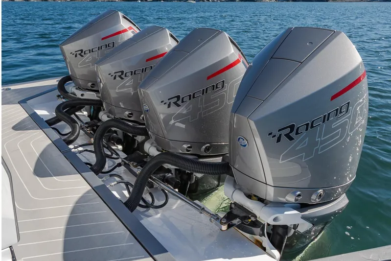 Desiderata Yacht Photos Pics Four powerful outboard engines on a 2023 Azimut Verve 47 boat, cruising on water.