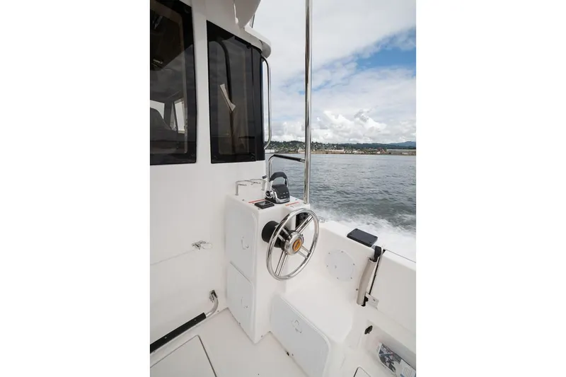 Ruff Life Yacht Photos Pics Manufacturer Provided Image: 2022 Cutwater C-30 Sedan boat helm station with ocean view.
