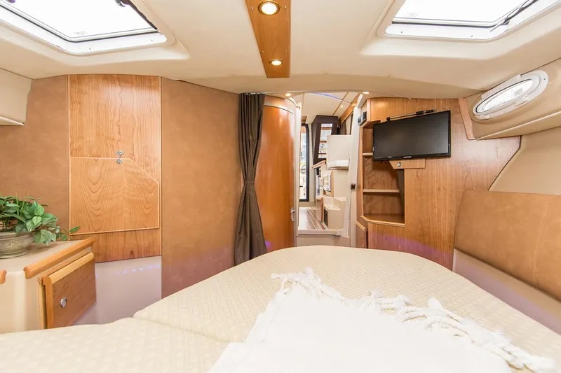 Ruff Life Yacht Photos Pics Manufacturer Provided Image: Interior of 2022 Cutwater C-30 Sedan boat with cozy bedroom and modern amenities.