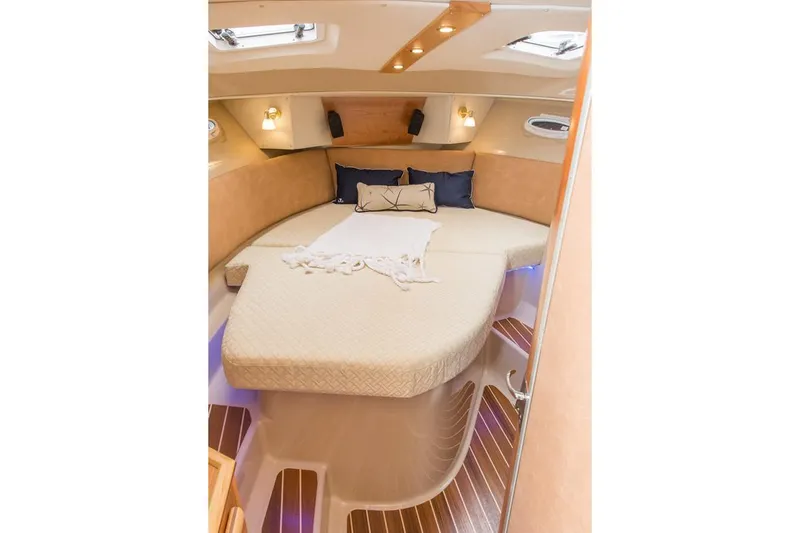 Ruff Life Yacht Photos Pics Manufacturer Provided Image: 2022 Cutwater C-30 Sedan cabin with cozy bed and elegant lighting.