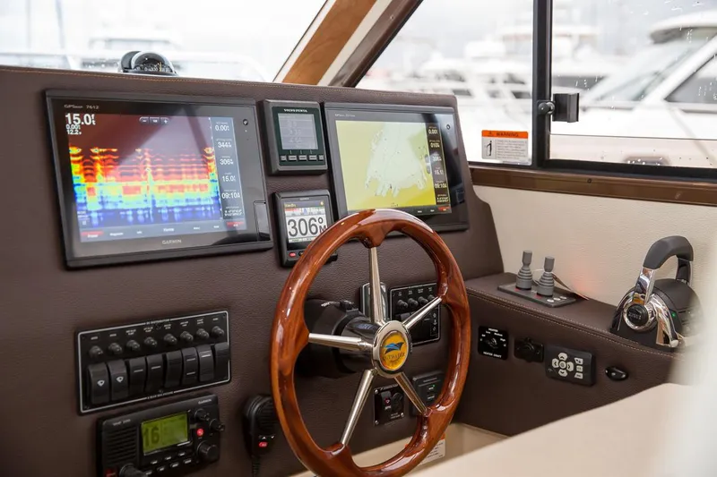 Ruff Life Yacht Photos Pics Manufacturer Provided Image: 2022 Cutwater C-30 Sedan helm with advanced navigation and control systems.