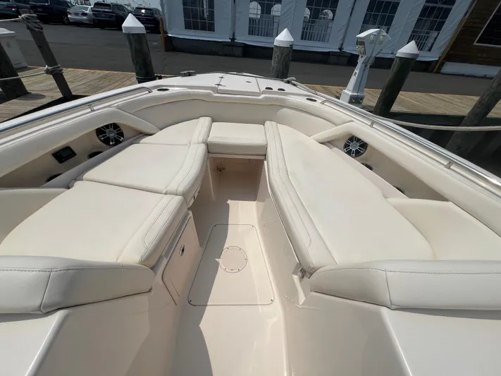  Yacht Photos Pics 2020 Grady-White Freedom 335 boat interior with spacious seating and sleek design.