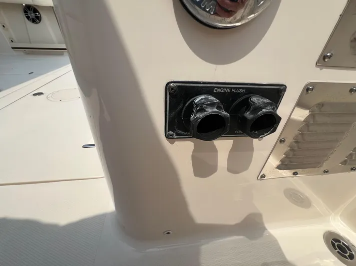  Yacht Photos Pics Grady-White Freedom 335 boat engine flush ports, 2020 model, close-up view.