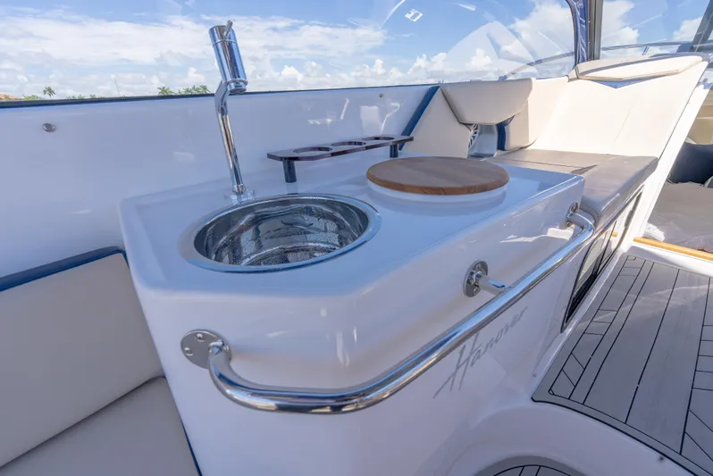  Yacht Photos Pics Luxury Hanover 305 yacht interior with sink and seating, 2024 model.