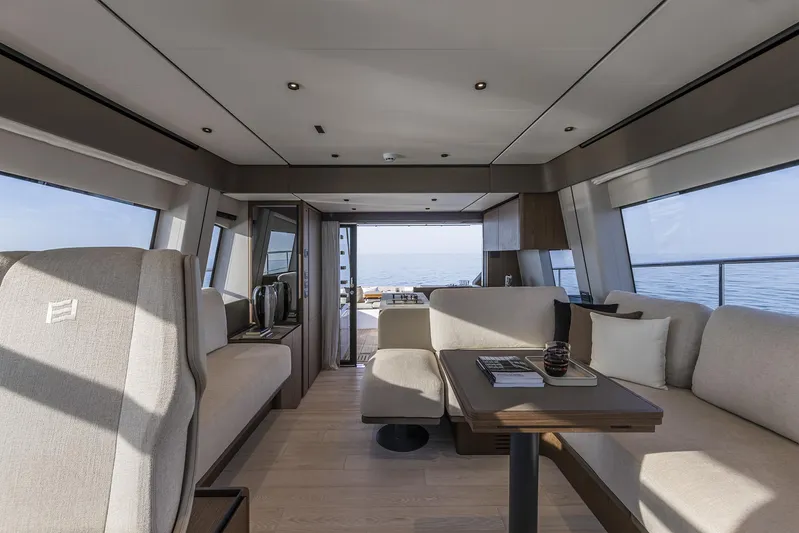  Yacht Photos Pics Luxurious interior of 2025 Ferretti Yachts 580 with modern seating and ocean view.