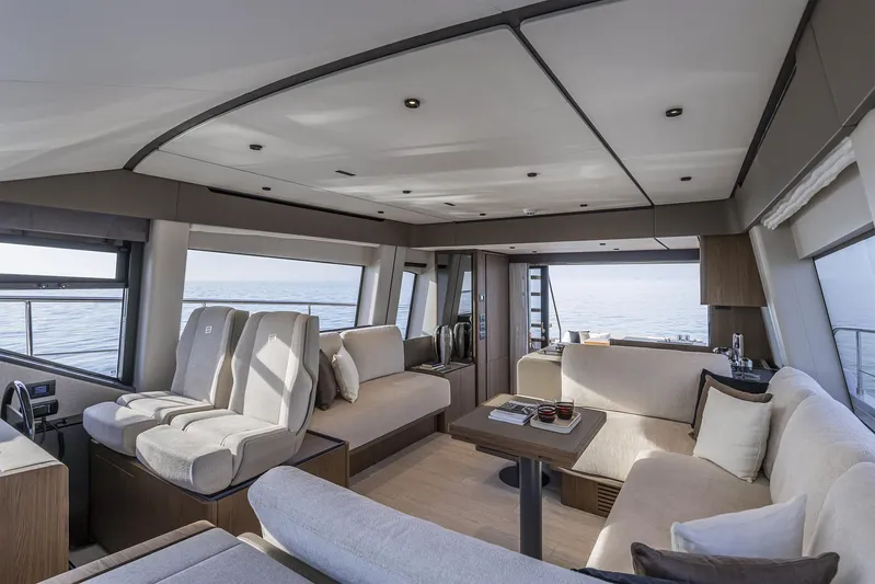  Yacht Photos Pics Luxurious interior of 2025 Ferretti Yachts 580 with modern seating and ocean view.