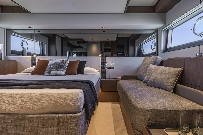  Yacht Photos Pics Luxurious interior of 2025 Ferretti Yachts 580, featuring elegant bedroom and seating area.
