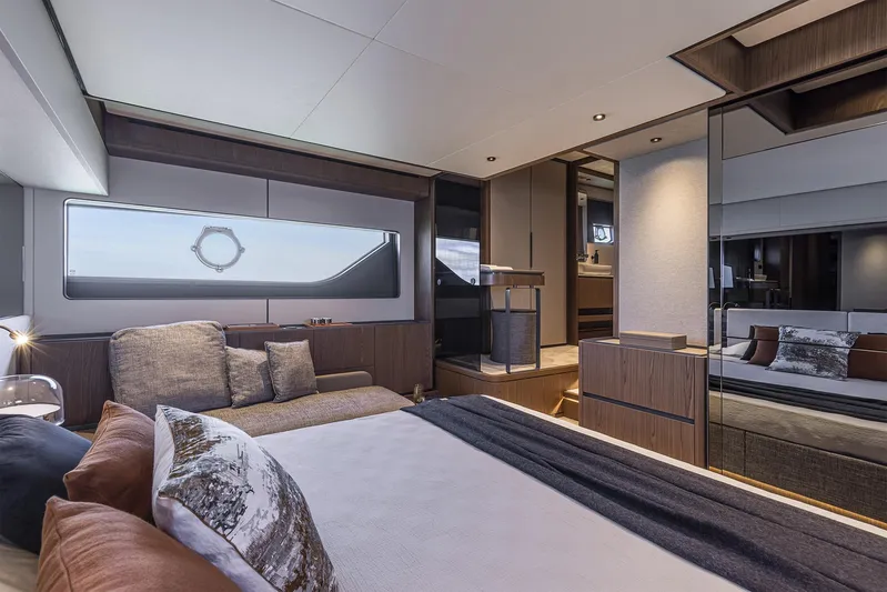  Yacht Photos Pics Luxurious interior of 2025 Ferretti Yachts 580, featuring elegant bedroom design and modern furnishings.