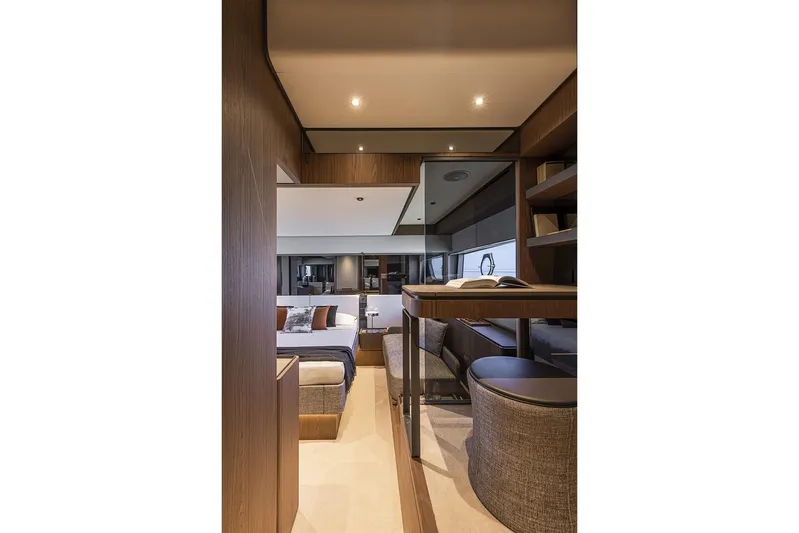  Yacht Photos Pics Luxurious interior of 2025 Ferretti Yachts 580, featuring elegant wood finishes and modern design.