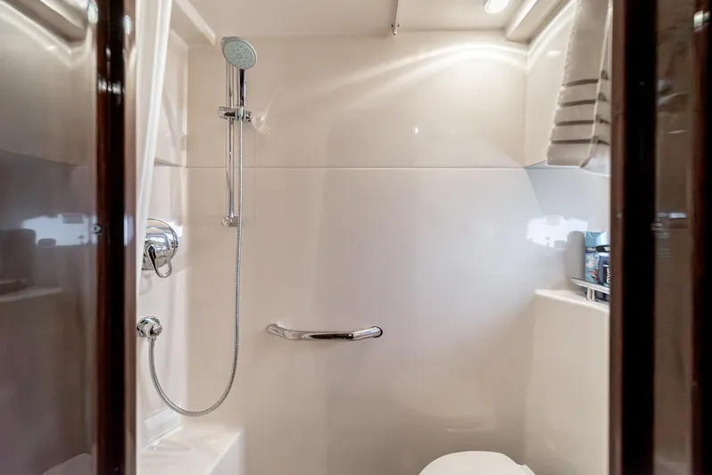  Yacht Photos Pics Bathroom interior of 2007 Sea Ray 48 Sundancer yacht, featuring shower and modern fixtures.