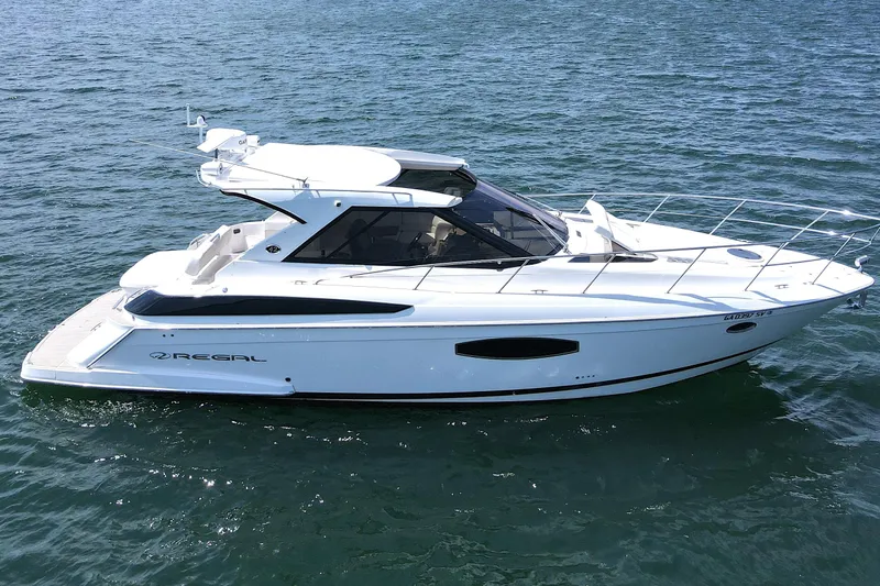Absolutely Yacht Photos Pics 2017 Regal 42 Sport Coupe yacht cruising on open water.
