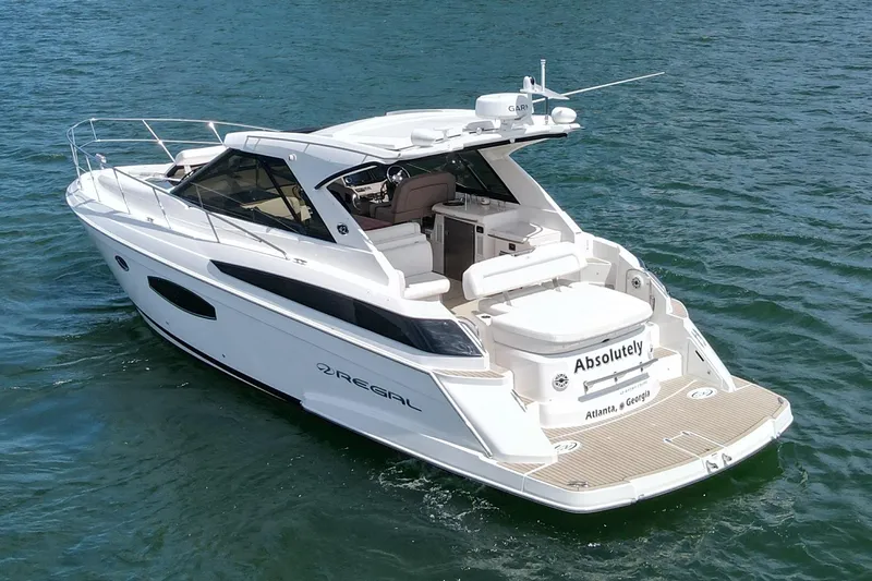 Absolutely Yacht Photos Pics 2017 Regal 42 Sport Coupe yacht cruising on open water.