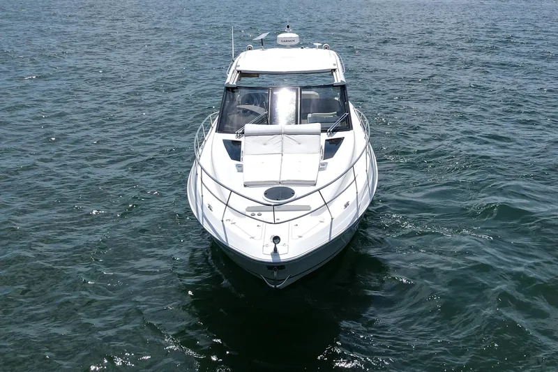 Absolutely Yacht Photos Pics 2017 Regal 42 Sport Coupe yacht cruising on open water.